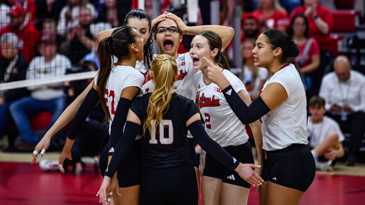 The Huskers celebrate a kill from Harper Murray. The Huskers celebrate a kill from Harper Murray.