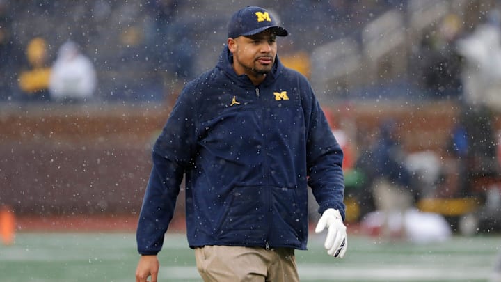 Michigan tight ends coach Grant Newsome watches warm up before the Nebraska game in Ann Arbor on Saturday, Nov. 12, 2022.
