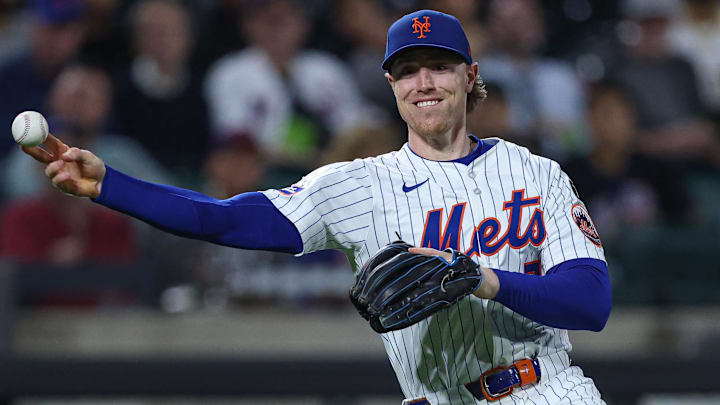 Sep 17, 2025; New York City, New York, USA; New York Mets third baseman Brett Baty (7) throws the ball to first base for an out during the first inning against the San Diego Padres  at Citi Field. 