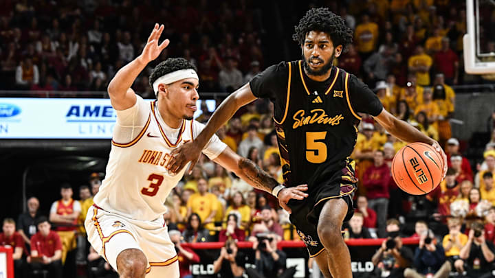 Mar 7, 2026; Ames, Iowa, USA; Arizona State Sun Devils guard Maurice Odum (5) is defended by Iowa State Cyclones guard Tamin Lipsey (3) during the second half at James H. Hilton Coliseum. Mandatory Credit: Jeffrey Becker-Imagn Images Mar 7, 2026; Ames, Iowa, USA; Arizona State Sun Devils guard Maurice Odum (5) is defended by Iowa State Cyclones guard Tamin Lipsey (3) during the second half at James H. Hilton Coliseum. Mandatory Credit: Jeffrey Becker-Imagn Images
