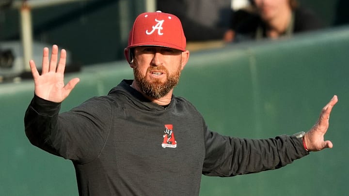 Feb 18, 2025; Tuscaloosa, Alabama, USA; Alabama baseball head coach Rob Vaughn gestures for a timeout during the game with Middle Tennessee State at Sewell-Thomas Stadium.