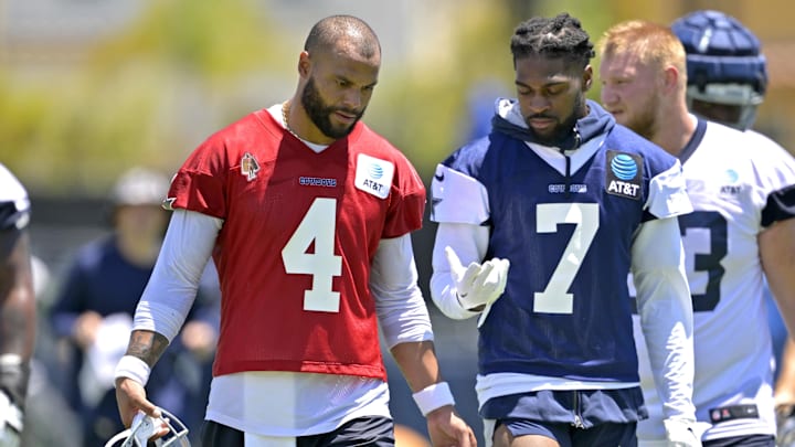 Dallas Cowboys quarterback Dak Prescott talks with cornerback Trevon Diggs during training camp in Oxnard, CA. Dallas Cowboys quarterback Dak Prescott talks with cornerback Trevon Diggs during training camp in Oxnard, CA.