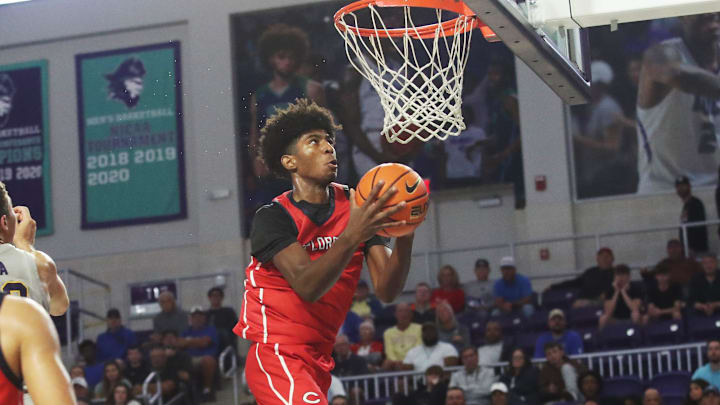 Jaxon Richardson of the Miami Columbus High School basketball team drives to the basket during the championship game against Montverde at the City of Palms Classic at Suncoast Credit Union Arena in Fort Myers on Monday, Dec. 23, 2024.
