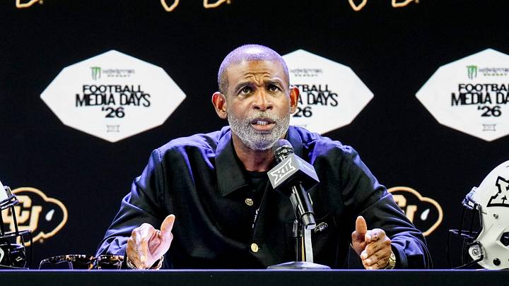 Jul 7, 2026; Frisco, TX, USA; Colorado head coach Deion Sanders speaks to reporters during Big 12 Conference Football Media Days at The Star. Mandatory Credit: Raymond Carlin III-Imagn Images Jul 7, 2026; Frisco, TX, USA; Colorado head coach Deion Sanders speaks to reporters during Big 12 Conference Football Media Days at The Star. Mandatory Credit: Raymond Carlin III-Imagn Images