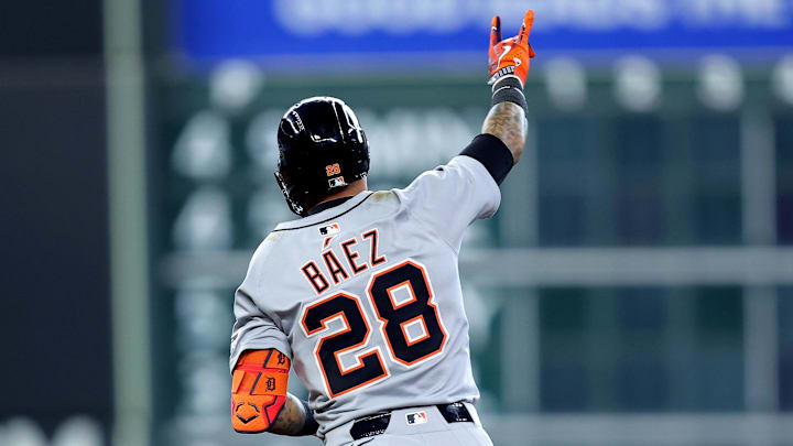 Apr 30, 2025; Houston, Texas, USA; Detroit Tigers center fielder Javier Baez (28) reacts after hitting a grand slam home run against the Houston Astros during the third inning at Daikin Park.