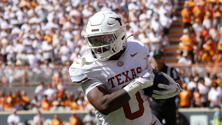 Texas Longhorns running back Raleek Brown (0) runs against Tennessee Volunteers linebacker Amare Campbell (0) during the second half at Neyland Stadium. Texas Longhorns running back Raleek Brown (0) runs against Tennessee Volunteers linebacker Amare Campbell (0) during the second half at Neyland Stadium.