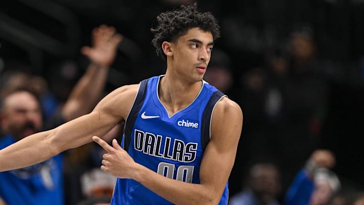 Feb 10, 2025; Dallas, Texas, USA; Dallas Mavericks guard Max Christie (00) celebrates making a three point basket during overtime against the Sacramento Kings at the American Airlines Center. Mandatory Credit: Jerome Miron-Imagn Images