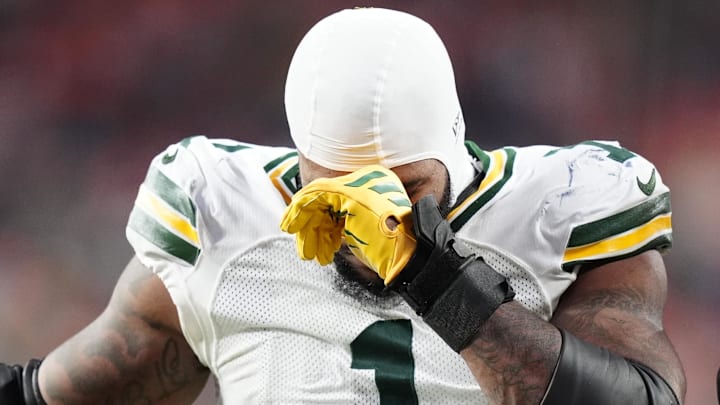 Dec 14, 2025; Denver, Colorado, USA; Green Bay Packers defensive end Micah Parsons (1) walks off the field with help from medical personnel following an injury during the third quarter against the Denver Broncos at Empower Field at Mile High. Dec 14, 2025; Denver, Colorado, USA; Green Bay Packers defensive end Micah Parsons (1) walks off the field with help from medical personnel following an injury during the third quarter against the Denver Broncos at Empower Field at Mile High.