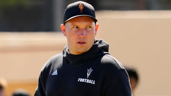 Arizona State head coach Kenny Dillingham watches his team as they run drills during a spring practice at Kajikawa practice fields in Tempe, Ariz. on April 14, 2026.