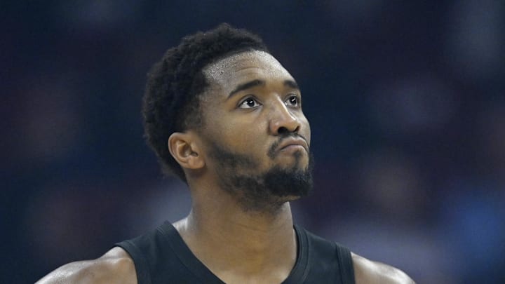 Cleveland Cavaliers guard Donovan Mitchell stands on the court in the first quarter against the Charlotte Hornets. Cleveland Cavaliers guard Donovan Mitchell stands on the court in the first quarter against the Charlotte Hornets.