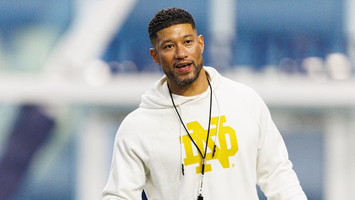 Head coach Marcus Freeman greets his players during a Notre Dame football practice at Irish Athletic Center on Friday, March 20, 2026, in South Bend.