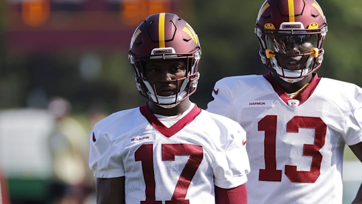 Jul 30, 2022; Ashburn, VA, USA; Washington Commanders wide receiver Terry McLaurin (17) stands with Commanders wide receiver Kyric McGowan (83) and Commanders wide receiver Kelvin Harmon (13) during day four of training camp at The Park in Ashburn. Mandatory Credit: Geoff Burke-Imagn Images