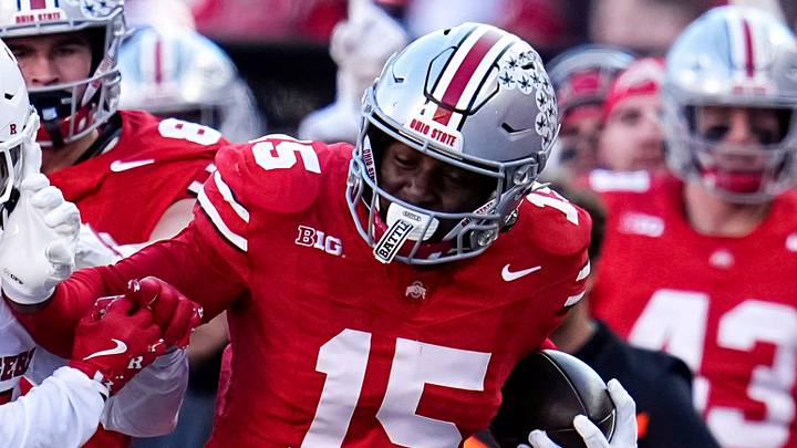 Ohio State Buckeyes tight end Jelani Thurman (15) runs past Rutgers Scarlet Knights defensive back Kaj Sanders (5) during the second half of the NCAA football game at Ohio Stadium in Columbus on Nov. 22, 2025. Ohio State won 42-9. Ohio State Buckeyes tight end Jelani Thurman (15) runs past Rutgers Scarlet Knights defensive back Kaj Sanders (5) during the second half of the NCAA football game at Ohio Stadium in Columbus on Nov. 22, 2025. Ohio State won 42-9.