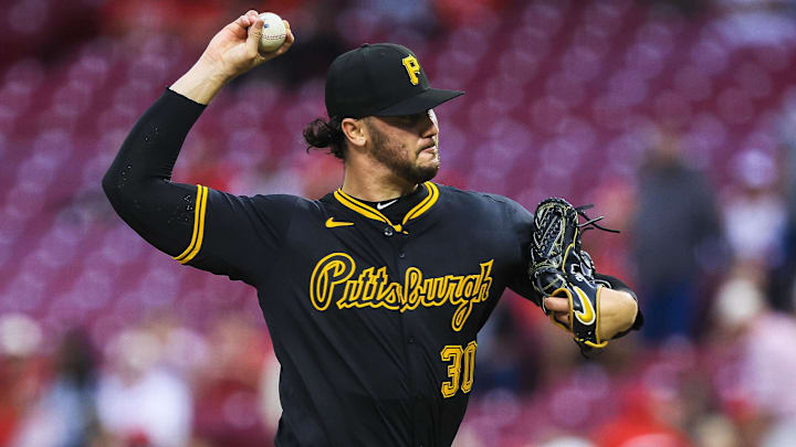 Sep 24, 2025; Cincinnati, Ohio, USA; Pittsburgh Pirates starting pitcher Paul Skenes (30) pitches against the Cincinnati Reds in the first inning at Great American Ball Park. Mandatory Credit: Katie Stratman-Imagn Images