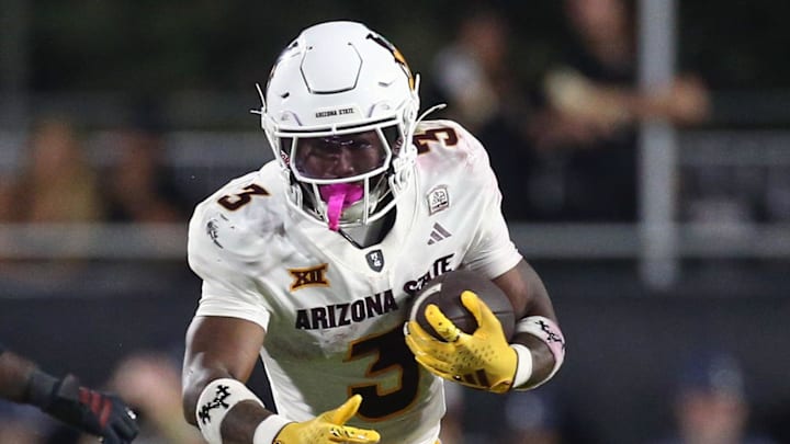 Sep 6, 2025; Starkville, Mississippi, USA; Arizona State Sun Devils running back Raleek Brown (3) runs the ball as Mississippi State Bulldogs linebacker Nic Mitchell (40) attempts to make the tackle during the fourth quarter at Davis Wade Stadium at Scott Field. Mandatory Credit: Petre Thomas-Imagn Images