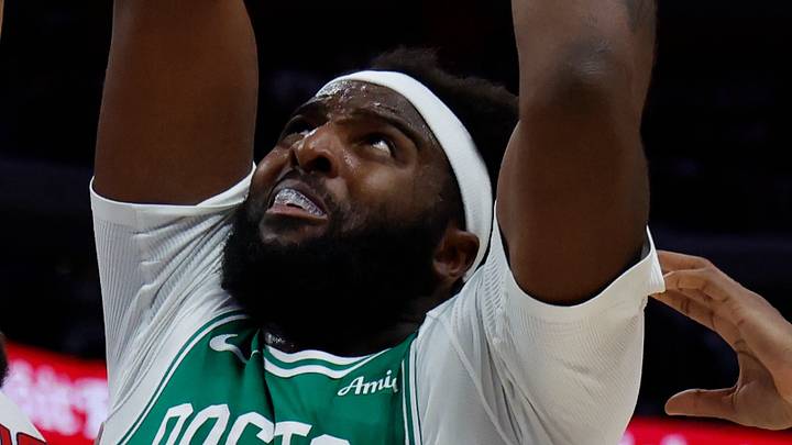 Oct 20, 2026; Detroit, Michigan, USA; Boston Celtics center-forward Mitchell Robinson (4) shoots defended by Detroit Pistons guard Cade Cunningham (2) in the second half at Little Caesars Arena. Mandatory Credit: Rick Osentoski-Imagn Images Oct 20, 2026; Detroit, Michigan, USA; Boston Celtics center-forward Mitchell Robinson (4) shoots defended by Detroit Pistons guard Cade Cunningham (2) in the second half at Little Caesars Arena. Mandatory Credit: Rick Osentoski-Imagn Images