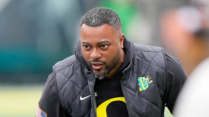 Oregon wide receivers coach Ross Douglas works with players during Oregon’s spring game on April 26, 2025, at Autzen Stadium in Eugene.