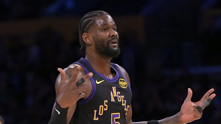 Apr 21, 2026; Los Angeles, California, USA; Los Angeles Lakers center Deandre Ayton (5) reacts on the court after a three-point basket by guard Marcus Smart (36) in the first half of game two of the first round of the 2026 NBA Playoffs against the Houston Rockets at Crypto.com Arena. Mandatory Credit: Jayne Kamin-Oncea-Imagn Images