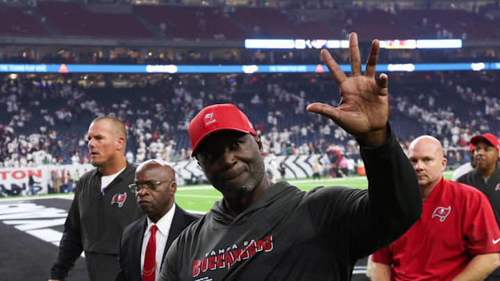 Tampa Bay Buccaneers head coach Todd Bowles waves to fans after the game against the Houston Texans.
