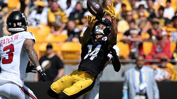Sep 13, 2026; Pittsburgh, Pennsylvania, USA;  Pittsburgh Steelers wide receiver Roman Wilson (14) jumps for a pass in front of Atlanta Falcons safety Jessie Bates III (3) during the second quarter at Acrisure Stadium.  Mandatory Credit: Barry Reeger-Imagn Images