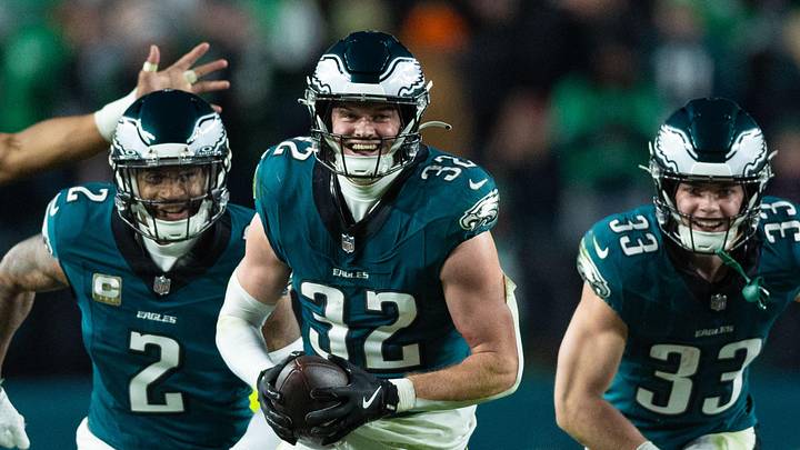 Nov 14, 2024; Philadelphia, Pennsylvania, USA; Philadelphia Eagles safety Reed Blankenship (32) celebrates with teammates after his interception during the fourth quarter against the Washington Commanders at Lincoln Financial Field. Mandatory Credit: Bill Streicher-Imagn Images