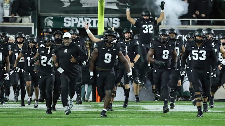 Michigan State Spartans interim head coach Harlon Barnett takes the field with his team before action against the Michigan Wolverines at Spartan Stadium in East Lansing on Saturday, Oct. 21, 2023.