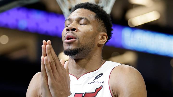 Oct 24, 2026; Charlotte, North Carolina, USA;  Miami Heat forward Giannis Antetokounmpo (7) says a prayer prior to the start of the game against the Charlotte Hornets at Spectrum Center.  Mandatory Credit: Brian Westerholt-Imagn Images