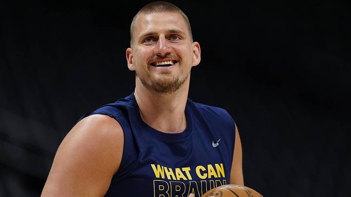 Apr 11, 2025; Denver, Colorado, USA; Denver Nuggets center Nikola Jokic (15) reacts before the game against the Memphis Grizzlies at Ball Arena. Mandatory Credit: Ron Chenoy-Imagn Images
