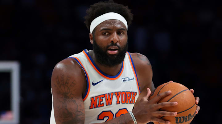 Nov 17, 2025; Miami, Florida, USA; New York Knicks center Mitchell Robinson (23) protects the basketball against the Miami Heat during the third quarter at Kaseya Center. Mandatory Credit: Sam Navarro-Imagn Images Nov 17, 2025; Miami, Florida, USA; New York Knicks center Mitchell Robinson (23) protects the basketball against the Miami Heat during the third quarter at Kaseya Center. Mandatory Credit: Sam Navarro-Imagn Images