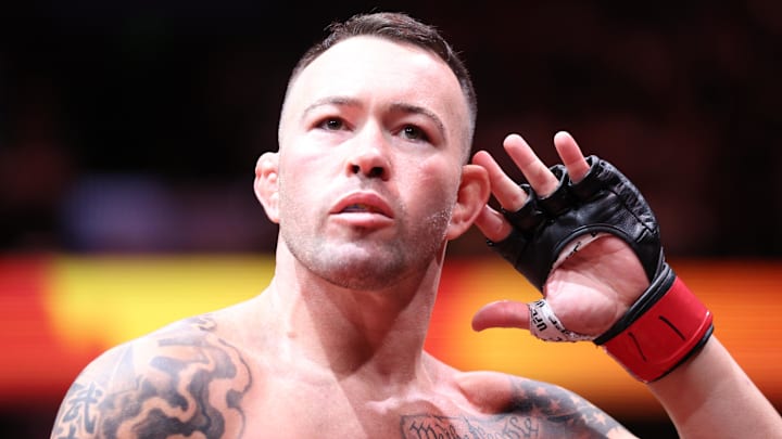 Dec 14, 2024; Tampa, Florida, UNITED STATES;  Colby Covington (red gloves) before the fight against Joaquin Buckley (blue gloves) at Amalie Arena. Mandatory Credit: Nathan Ray Seebeck-Imagn Images