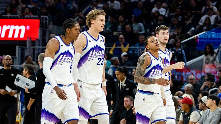 Jan 3, 2026; San Francisco, California, USA;  Utah Jazz forward Cody Williams (5) and forward Lauri Markkanen (23) and guard Keyonte George (3) and center Walker Kessler (24) walk off the court during a time out in the second quarter against the Golden State Warriors at Chase Center. Mandatory Credit: John Hefti-Imagn Images