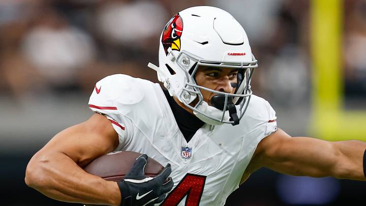 Aug 13, 2026; Paradise, Nevada, USA; Arizona Cardinals wide receiver Michael Wilson (14) stiff-arms Las Vegas Raiders cornerback Eric Stokes (5) after making a catch during the game at Allegiant Stadium. Mandatory Credit: David Brytus-Imagn Images Aug 13, 2026; Paradise, Nevada, USA; Arizona Cardinals wide receiver Michael Wilson (14) stiff-arms Las Vegas Raiders cornerback Eric Stokes (5) after making a catch during the game at Allegiant Stadium. Mandatory Credit: David Brytus-Imagn Images