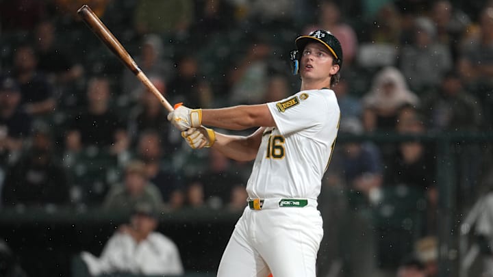 Sep 24, 2025; West Sacramento, California, USA; Athletics first baseman Nick Kurtz (16) hits a fly ball against the Houston Astros in the seventh inning at Sutter Health Park. Mandatory Credit: Cary Edmondson-Imagn Images
