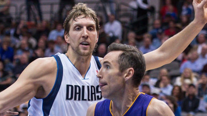 Former Los Angeles Lakers guard Steve Nash drives to the basket past Dallas Mavericks forward Dirk Nowitzki in a game. Former Los Angeles Lakers guard Steve Nash drives to the basket past Dallas Mavericks forward Dirk Nowitzki in a game.