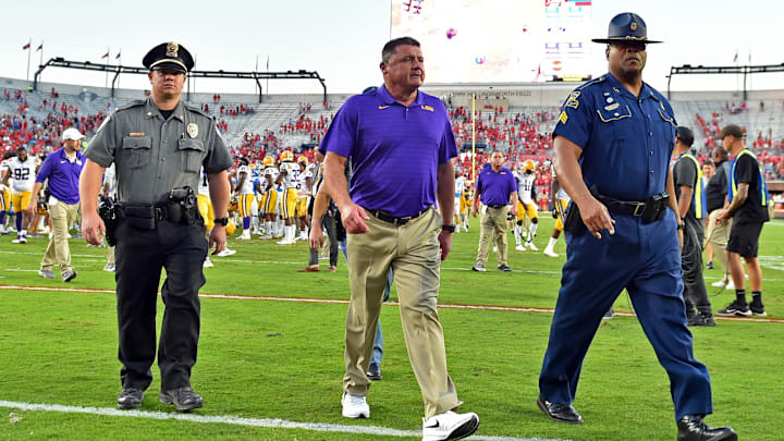 Oct 23, 2021; Oxford, Mississippi, USA; LSU Tigers head coach Ed Orgeron walks off the field after the game against the Mississippi Rebels at Vaught-Hemingway Stadium. Mandatory Credit: Justin Ford-Imagn Images Oct 23, 2021; Oxford, Mississippi, USA; LSU Tigers head coach Ed Orgeron walks off the field after the game against the Mississippi Rebels at Vaught-Hemingway Stadium. Mandatory Credit: Justin Ford-Imagn Images