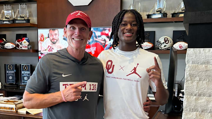 Oklahoma coach Brent Venables, commit Mikhail McCreary Oklahoma coach Brent Venables, commit Mikhail McCreary