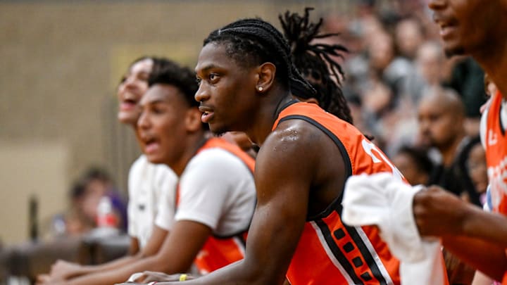 Team Snipes and Michigan State's Trey Fort looks on from the bench during the Moneyball Pro-Am on Tuesday, June 24, 2025, at Holt High School. Team Snipes and Michigan State's Trey Fort looks on from the bench during the Moneyball Pro-Am on Tuesday, June 24, 2025, at Holt High School.