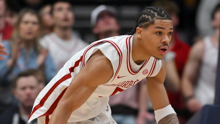 Mar 15, 2026; Nashville, TN, USA; Arkansas Razorbacks guard Darius Acuff Jr. (5) dribbles the ball against the Vanderbilt Commodores in the first half during the men's SEC Conference Tournament Championship at Bridgestone Arena. Mandatory Credit: Steve Roberts-Imagn Images