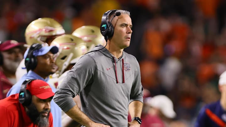 Oct 26, 2024; Miami Gardens, Florida, USA; Florida State Seminoles head coach Mike Norvell watches from the sideline against the Miami Hurricanes during the second quarter at Hard Rock Stadium. Mandatory Credit: Sam Navarro-Imagn Images