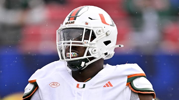 Nov 1, 2025; Dallas, Texas, USA;  SMU Miami Hurricanes defensive lineman Rueben Bain Jr. (4) warms up before the game against the SMU Mustangs at Gerald J. Ford Stadium. Mandatory Credit: Jerome Miron-Imagn Images