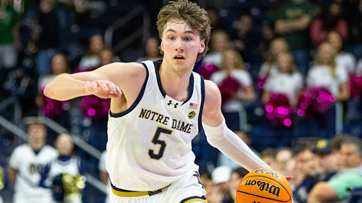 Feb 14, 2026; South Bend, Indiana, USA; Notre Dame Fighting Irish guard Cole Certa (5) dribbles down the court against the Georgia Tech Yellow Jackets during the second half at Purcell Pavilion at the Joyce Center. Feb 14, 2026; South Bend, Indiana, USA; Notre Dame Fighting Irish guard Cole Certa (5) dribbles down the court against the Georgia Tech Yellow Jackets during the second half at Purcell Pavilion at the Joyce Center.