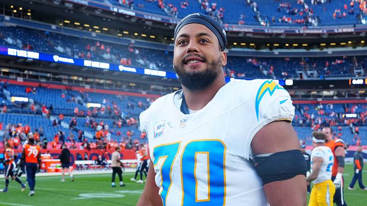 Oct 13, 2024; Denver, Colorado, USA; Los Angeles Chargers offensive tackle Rashawn Slater (70) following the win over the Denver Broncos at Empower Field at Mile High. Mandatory Credit: Ron Chenoy-Imagn Images Oct 13, 2024; Denver, Colorado, USA; Los Angeles Chargers offensive tackle Rashawn Slater (70) following the win over the Denver Broncos at Empower Field at Mile High. Mandatory Credit: Ron Chenoy-Imagn Images