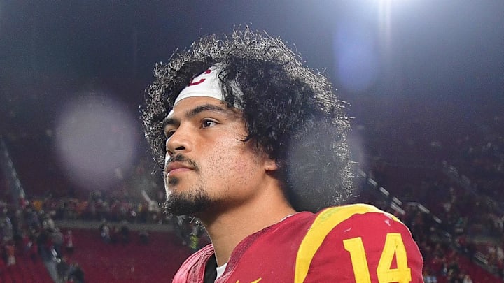 Nov 7, 2025; Los Angeles, California, USA; Southern California Trojans quarterback Jayden Maiava (14) leaves the field following the victory against the Northwestern Wildcats at the Los Angeles Memorial Coliseum. Mandatory Credit: Gary A. Vasquez-Imagn Images