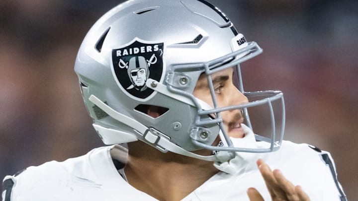 Aug 23, 2025; Glendale, Arizona, USA; Las Vegas Raiders quarterback Aidan O'Connell (12) against the Arizona Cardinals during a preseason NFL game at State Farm Stadium. Mandatory Credit: Mark J. Rebilas-Imagn Images