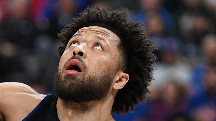 Feb 27, 2026; Detroit, Michigan, USA;   Cleveland Cavaliers guard Jaylon Tyson (20) battles for position with Detroit Pistons guard Cade Cunningham (2): Lon Horwedel-Imagn Images