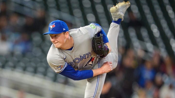 May 1, 2026; Minneapolis, Minnesota, USA; Toronto Blue Jays pitcher Louis Varland (77) throws to Minnesota Twins center fielder James Outman (30) in the ninth inning at Target Field.