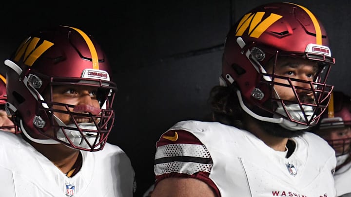 Nov 14, 2024; Philadelphia, Pennsylvania, USA; Washington Commanders offensive tackle Brandon Coleman (74) and guard Sam Cosmi (76) against the Philadelphia Eagles at Lincoln Financial Field. Mandatory Credit: Eric Hartline-Imagn Images