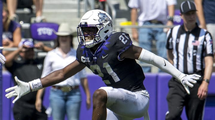 Sep 23, 2023; Fort Worth, Texas, USA; TCU Horned Frogs defensive lineman Caleb Fox (90) and safety Bud Clark (21) celebrate during the game between the TCU Horned Frogs and the SMU Mustangs at Amon G. Carter Stadium.