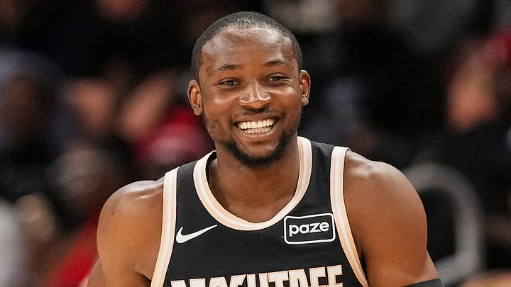 Feb 26, 2026; Atlanta, Georgia, USA; Atlanta Hawks forward Jonathan Kuminga (0) reacts after making a three point shot against the Washington Wizards during the first half at State Farm Arena. Mandatory Credit: Dale Zanine-Imagn Images