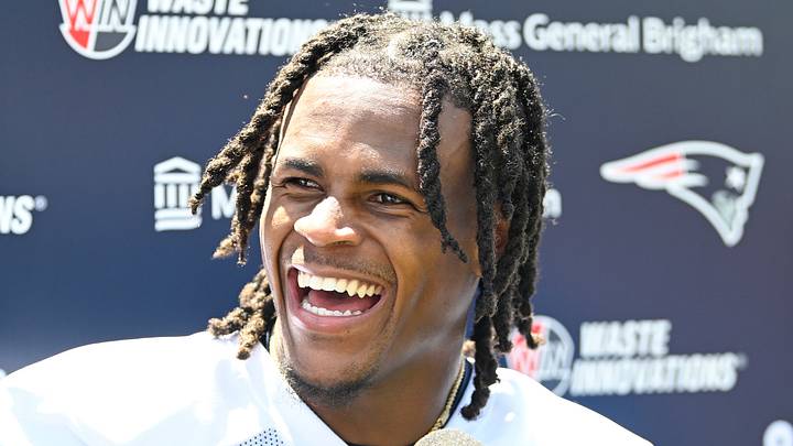 Jul 23, 2025; Foxborough, MA, USA; New England Patriots wide receiver DeMario Douglas (3) reacts to a question from the media after practice during day one of training camp at Gillette Stadium. Mandatory Credit: Eric Canha-Imagn Images Jul 23, 2025; Foxborough, MA, USA; New England Patriots wide receiver DeMario Douglas (3) reacts to a question from the media after practice during day one of training camp at Gillette Stadium. Mandatory Credit: Eric Canha-Imagn Images
